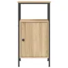 A product shot of a small cabinet with a door and two shelves, made of wood-look material and black metal frame. Podgląd zdjęcia produktu