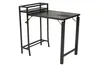 A dark gray folding balcony table with a shelf unit on the left side, shown against a white background. Produktbild-Vorschau