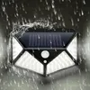 A solar-powered outdoor light fixture is shown mounted on a wall during a rain shower, with water splashing around it. Voir les images du produit
