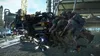A group of zombies are attacking a modified vehicle in an industrial area. Produktbild-Vorschau