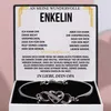 A jewelry box containing a bracelet, with a card inside displaying a message. Voir les images du produit