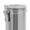 A close-up shot of a stainless steel storage container with a clear lid and a silver latch. Voir les images du produit