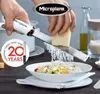 A person is grating cheese over a bowl of food with a Microplane grater. Anteprima dell’immagine prodotto
