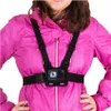 A person wearing a pink jacket with a chest mount for a camera. Anteprima dell’immagine prodotto