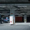 Interior of a parking garage with cars and lighting. Produktbild-Vorschau
