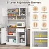 A white kitchen cabinet with adjustable shelves, a microwave, and various kitchen items displayed. Produktbild-Vorschau