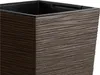 A close-up view of the textured surface of a brown planter. Produktbild-Vorschau