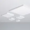 Several square LED ceiling lights of varying sizes are mounted on a white ceiling. Produktbild-Vorschau