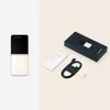 A split image showing a folded smartphone on the left and its packaging and accessories on the right. Náhled obrázku produktu