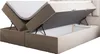 A beige upholstered boxspring bed with the mattress and storage compartments lifted to reveal the interior. Produktbild-Vorschau