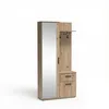 A tall, narrow wardrobe with a full-length mirror on the left and coat hooks and drawers on the right, set against a white background. Voir les images du produit