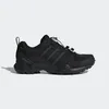 A black Adidas Terrex hiking shoe is shown against a white background. Anteprima dell’immagine prodotto