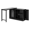 A black cabinet with a sliding glass door and shelves, attached to a black table with a metal frame. Anteprima dell’immagine prodotto