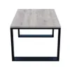 A coffee table with a light wood top and black metal legs, shown from a top-down perspective. Náhled obrázku produktu