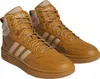 A pair of brown Adidas high-top sneakers with beige accents. Anteprima dell’immagine prodotto