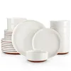 A collection of white ceramic plates and bowls with brown accents, arranged on a white background. Produktbild-Vorschau