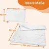 A pillow and a folded duvet are shown with dimensions indicated by arrows and text. Voir les images du produit