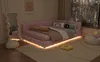 A pink daybed with ambient lighting in a bedroom setting. Podgląd zdjęcia produktu