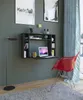 A modern workspace with a wall-mounted desk and a red chair. Podgląd zdjęcia produktu