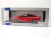 A red Audi RS3 model car is displayed in its original packaging. Produktbild-Vorschau
