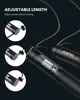 A close-up shot of a black jump rope with a digital counter on the handle. The background is dark and plain. Produktbild-Vorschau