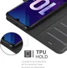 A close-up of a black phone case with a phone inside, highlighting the TPU holder feature. Náhľad obrázku produktu