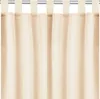 A close-up view of a beige curtain hanging from a rod. Náhled obrázku produktu