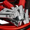 A close-up view of several car jumper cable clamps. Náhled obrázku produktu
