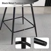 Close-up view of the black metal footrest structure of a bar stool. Produktbild-Vorschau