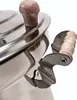 Close-up of a stainless steel samovar with wooden handles and lid knob. Produktbild-Vorschau