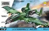 The image shows the packaging for a COBI A-10 Thunderbolt II Warthog building block set. The packaging features a dynamic illustration of the aircraft in flight, along with product details and branding. Náhled obrázku produktu
