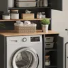 A washing machine cabinet with storage shelves and a washing machine. Anteprima dell’immagine prodotto