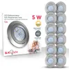 A product box for LED downlights with a stack of the downlights to the right. Voir les images du produit