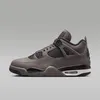 A side view of a single Nike Air Jordan 4 Retro sneaker against a plain gray background. Náhled obrázku produktu
