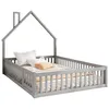 A grey house-shaped bed frame with a mattress and pillows. Voir les images du produit