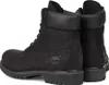 A pair of black Timberland boots shown from a side-angle. Anteprima dell’immagine prodotto