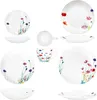 A collection of white porcelain dinnerware with a floral pattern, arranged in a collage. Produktbild-Vorschau