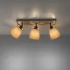 A ceiling light fixture with three adjustable fabric shades is mounted on a light-colored wooden base against a white ceiling. Produktbild-Vorschau