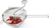 A stainless steel sieve with berries inside, on a white background. Produktbild-Vorschau
