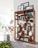 A wooden bookshelf filled with books and decorative items in a well-lit room. Produktbild-Vorschau