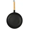 A black cast iron frying pan with a wooden handle is shown against a white background. Podgląd zdjęcia produktu