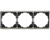 A product shot of a triple-gang switch frame. Náhled obrázku produktu
