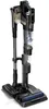 A cordless vacuum cleaner on its charging base. Náhľad obrázku produktu