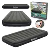 A collage of images showcasing a Bestway air mattress from different angles and in packaging, along with a lifestyle shot of a person sleeping on it. Náhled obrázku produktu