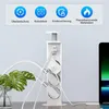 A pop-up power strip with USB ports is shown on a desk, with a plant and a laptop in the background. Produktbild-Vorschau