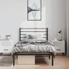 A bedroom scene with a bed, nightstands, and artwork. Podgląd zdjęcia produktu