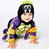A baby crawling on a white background wearing a spider costume. Produktbild-Vorschau