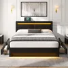 A modern black upholstered bed frame with integrated LED lighting and storage drawers, set in a well-lit bedroom. Náhľad obrázku produktu