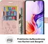 A pink flip phone case with card slots and a phone inside displaying a colorful wallpaper. Produktbild-Vorschau
