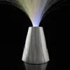A close-up shot of a fiber optic lamp with a silver base and colorful fiber optic strands emitting light. Voir les images du produit